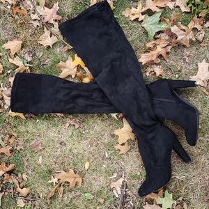 Black over the knee high heeled boots